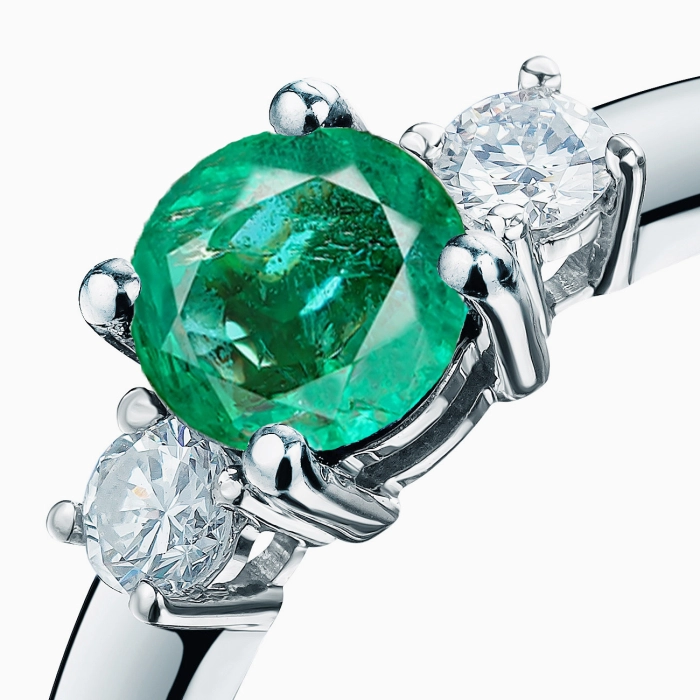 White gold ring with natural emerald and diamonds - К100025.42