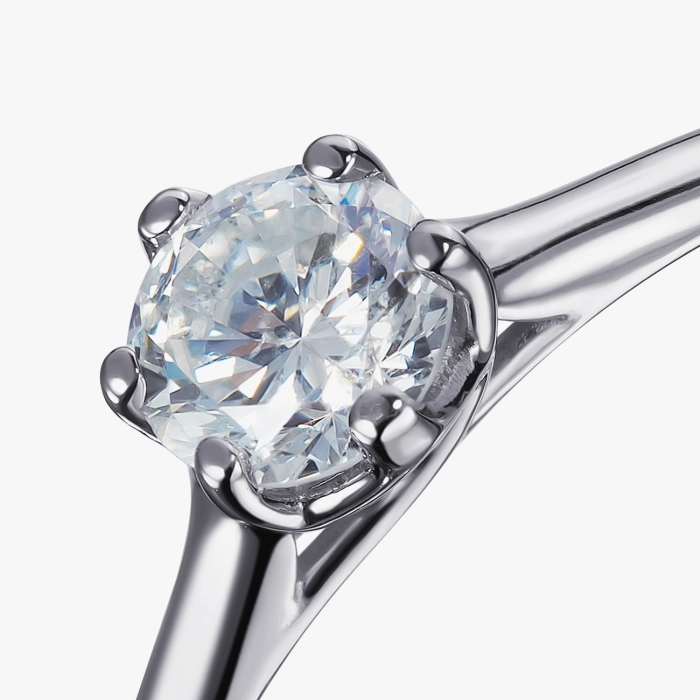 White gold ring with a 0.5 carat diamond - К100055.52