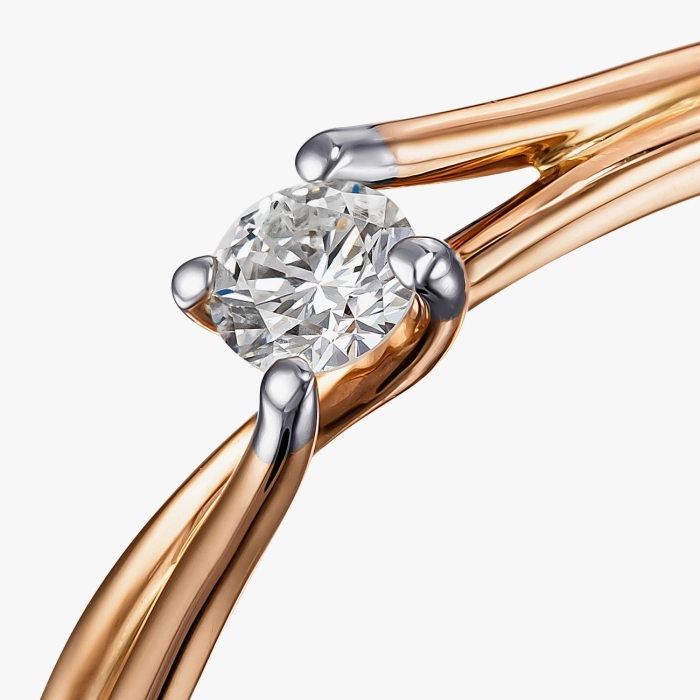 Red gold ring with a diamond in an elegant frame - К1961